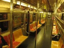 Interior_of_R62_Subway-min.jpg